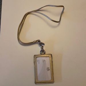 Coach lanyard with wallet and ID badge